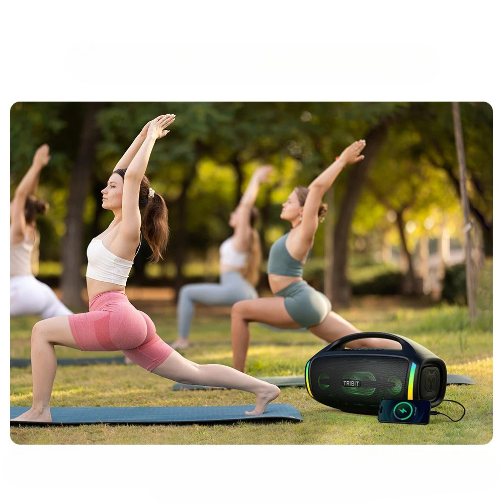 Boxa portabila Tribit StormBox Blast 2 folosita la yoga in aer liber, cu Bluetooth, iluminare RGB si sunet puternic